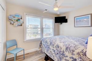 Ένα ή περισσότερα κρεβάτια σε δωμάτιο στο Seaside Heights +21 φωτογραφίες