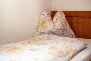 Postel nebo postele na pokoji v ubytování Raffreiderhof Apt Fichte