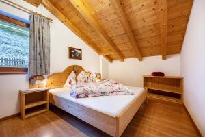 Postel nebo postele na pokoji v ubytování Raffreiderhof Apt Fichte