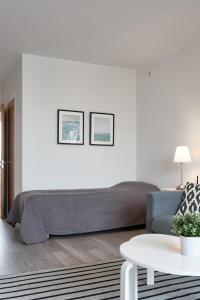 Zona d'estar a Comodo Apartments - One bedroom apartment - Munkkisaari, Helsinki