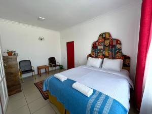 Postel nebo postele na pokoji v ubytování Duet Hostel & Hotel