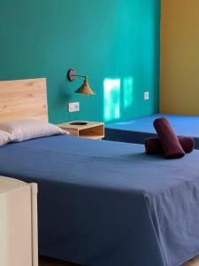 Postel nebo postele na pokoji v ubytování Hostel Friends Barcelona