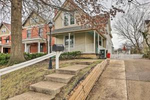 a house with a white fence in front of it at Northern Kentucky Studio Near Cincinnati! in Southgate