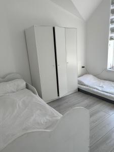 Cama o camas de una habitación en Коттедж на Иссыкуле ЦО Париж-2
