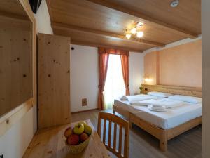 Postel nebo postele na pokoji v ubytování Agritur Sandro