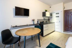 Kuchyňa alebo kuchynka v ubytovaní Modern apartment in best location