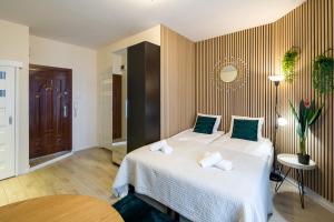 Posteľ alebo postele v izbe v ubytovaní Modern apartment in best location