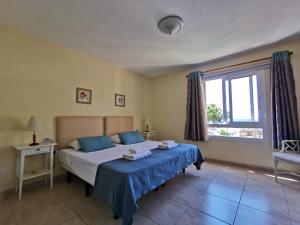 Posteľ alebo postele v izbe v ubytovaní Dona Lola Martha - Spacious 3 bedroom apartment with partial sea views