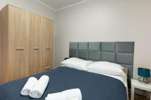 Posteľ alebo postele v izbe v ubytovaní Apartament Słoneczny z tarasem i ogrodem