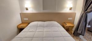 Postel nebo postele na pokoji v ubytování Athens Plaka Family Suites