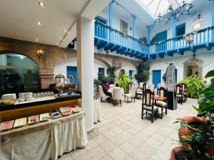 Posezení v ubytování Hotel Rojas Inn