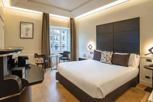 Postel nebo postele na pokoji v ubytování 47 Boutique Hotel