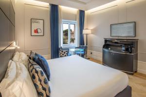 Postel nebo postele na pokoji v ubytování 47 Boutique Hotel