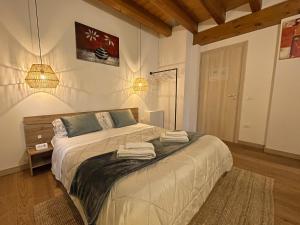 A bed or beds in a room at Agriturismo Vecio Portico