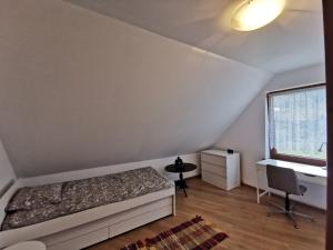 Postel nebo postele na pokoji v ubytování Domek na Niedźwiedziarce