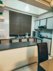 Η κουζίνα ή μικρή κουζίνα στο BotakCuteHomestay@Mahkota +10 φωτογραφίες