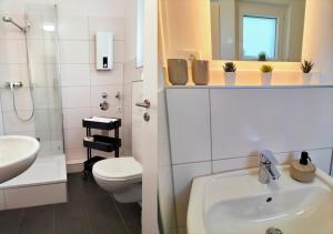 Koupelna v ubytování Living-Life, Klinik & Messe vor Ort, Wlan, Netflix + 9 fotografií