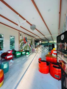 a bowling alley with many different coloredools in a room at Somrudee Resort in Nakhon Nayok