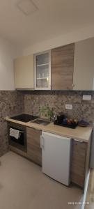 a kitchen with a sink and a counter top at Cozy place in Trebinje