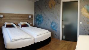 Motel Arctic Wind客房内的一张或多张床位