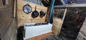 a kitchen with a stove and pots and pans at Casa grande Nubes de Monteverde in Monteverde Costa Rica