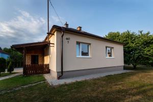 a small house in a yard with at StoneMlynska 7 Slovakia in Svit