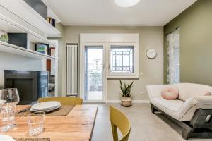 a living room with a couch and a table at Casa Pepe in Rome