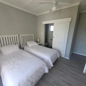Postel nebo postele na pokoji v ubytování Villa Laks