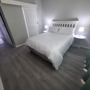 Postel nebo postele na pokoji v ubytování Villa Laks