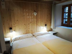 A bed or beds in a room at La Milana, Orbaneja del Castillo