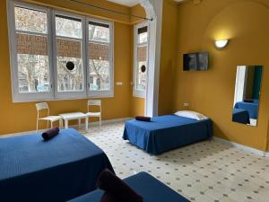 Postel nebo postele na pokoji v ubytování Hostel Friends Barcelona