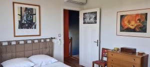 Ένα ή περισσότερα κρεβάτια σε δωμάτιο στο Chambre privée chez particulier