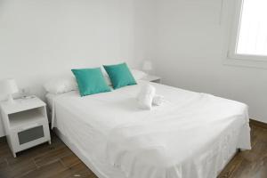 Ένα ή περισσότερα κρεβάτια σε δωμάτιο στο Alma del Mar