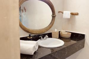 Koupelna v ubytování Akalki Hotel y Centro Holistico + 25 fotografií