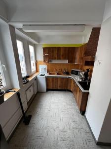 Kuchyňa alebo kuchynka v ubytovaní appartement in center