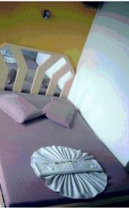 Postel nebo postele na pokoji v ubytování Hotel Don Juan