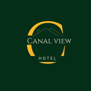a logo for a hotel with a roof at Canal view hotel in Faisalabad