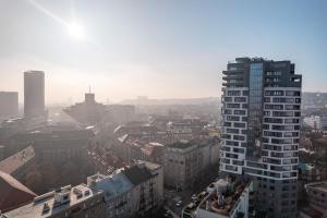 a view of a city with a tall building at LAM Premiere with best view in Bratislava in Bratislava