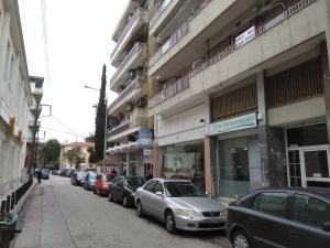 a row of cars parked on the side of a street at Brand New Studio 1 in Komotini