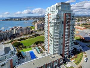 an aerial view of a tall building next to the water at Admiral's Anchor by IRIS PROPERTIES! in Victoria