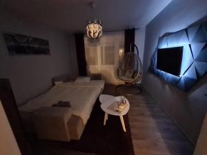 เตียงในห้องที่ Grey & Sunny Apartments Zaječar