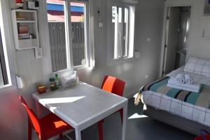 Postel nebo postele na pokoji v ubytování Container Departamento en Puerto Natales