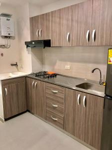 Una cocina o zona de cocina en Espectacular Apartamento Caney 401