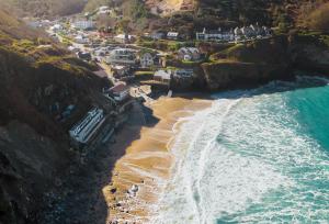 an aerial view of a beach with houses and the ocean at Rozel in St. Agnes