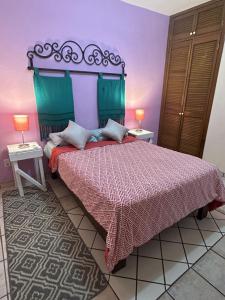 Postel nebo postele na pokoji v ubytování Sofia Hostel Cabo