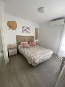 Postel nebo postele na pokoji v ubytování Iris Vistas Benalmadena