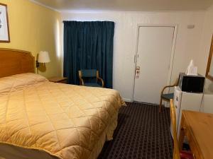 Postel nebo postele na pokoji v ubytování RANGER MOTEL