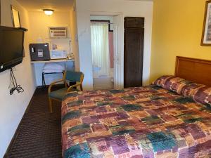 Postel nebo postele na pokoji v ubytování RANGER MOTEL