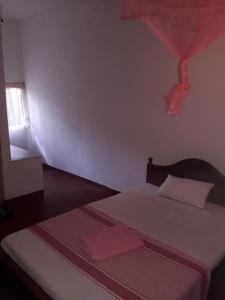 Postel nebo postele na pokoji v ubytování Margosa Guesthouse