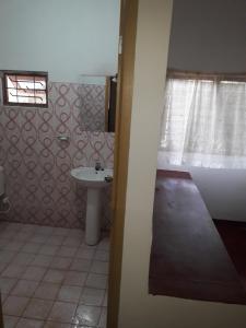 Koupelna v ubytování Margosa Guesthouse